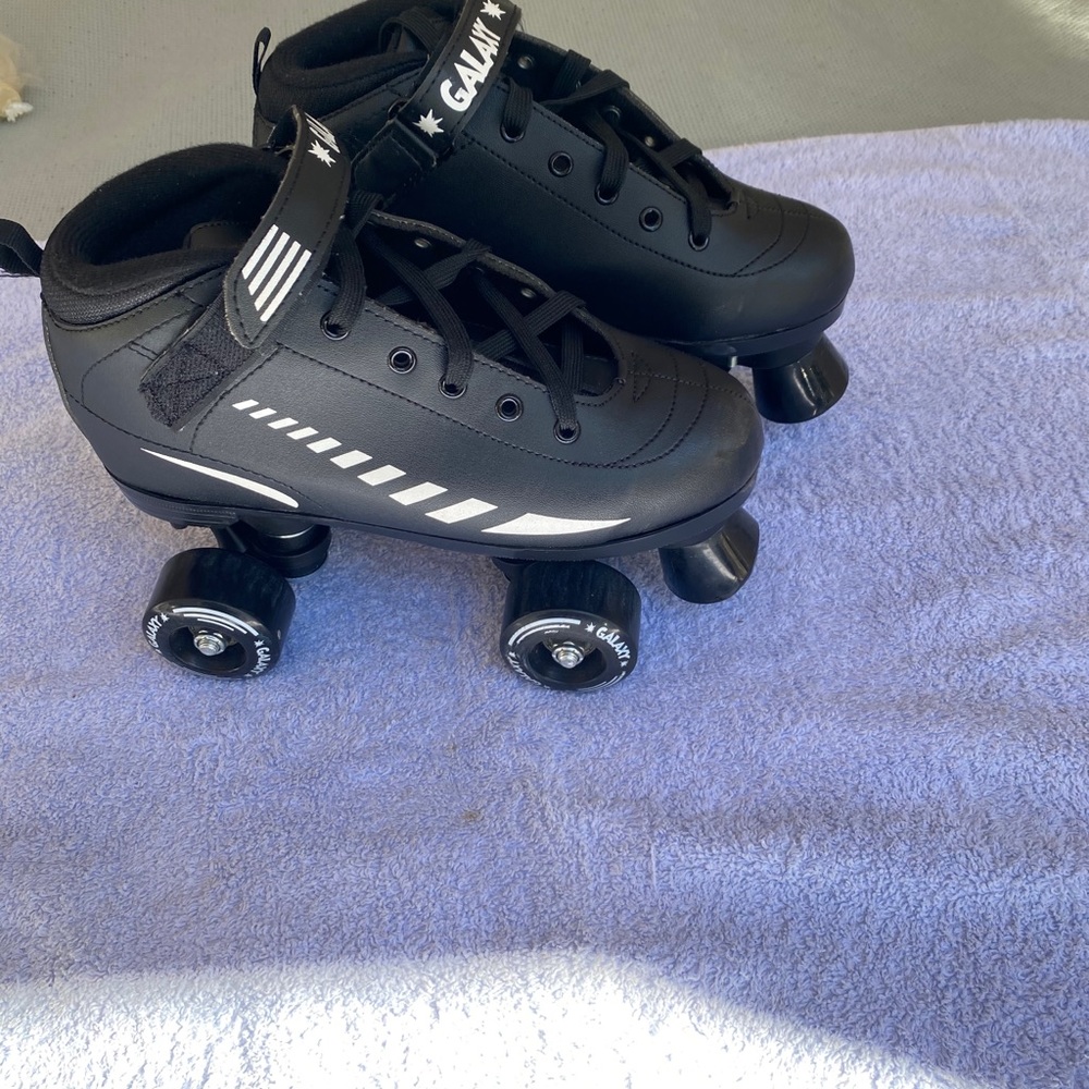 NIKE GALAXY ROLLER SKATES